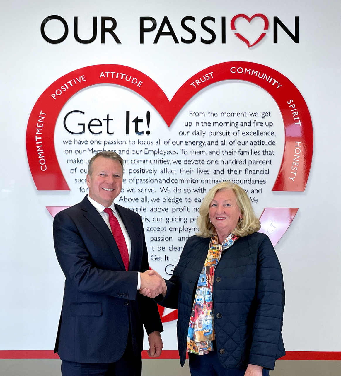 MVCU President & CEO John J. Howard and CBCU Manager Marta Carney at MVCU’s Lawrence corporate office. 