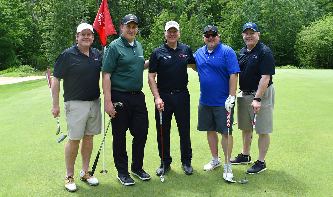 MVCU President John J. Howard with representatives from the credit union and tournament sponsor, Synergent